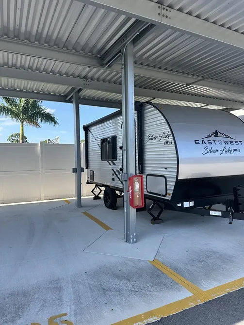 Covered parking bays for cars, trucks, and RVs at Punta Gorda Century Storage.